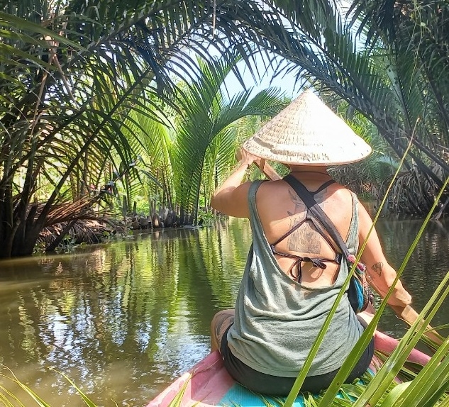 Explore Mekong river by boat with Amy